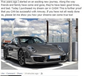 Image of Porche car with clouds in background Porche apparently purchased in Cash by Amway Distributor